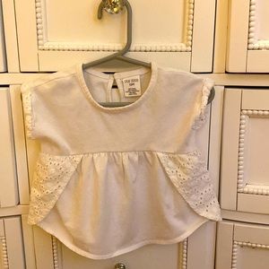 Toddlers 12 month white peplum top, some embroidery on the sides